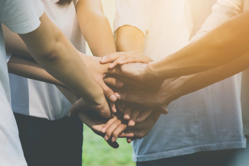 Hands of volunteers